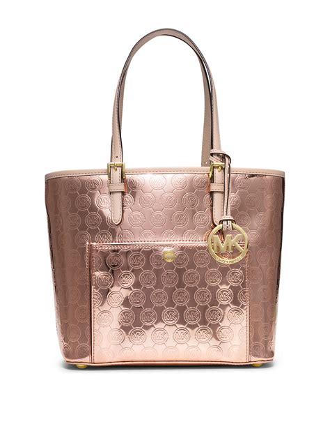 michael kors gold monogram tote|Michael Kors Tote bag pink.